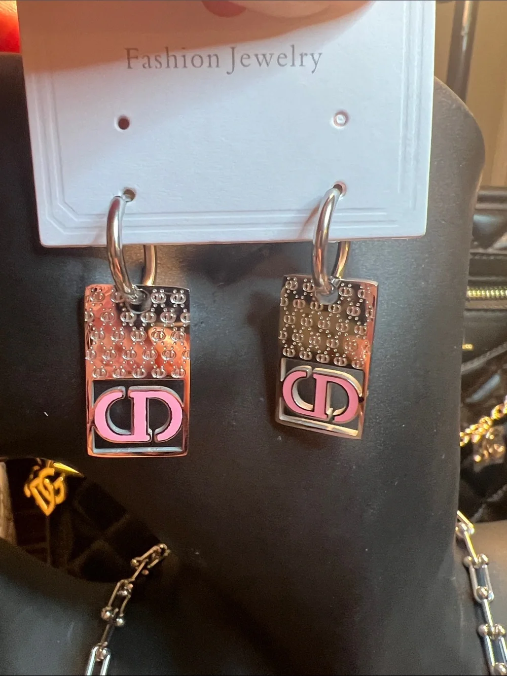 Silver-Tone Earrings with Pink Logo Accent